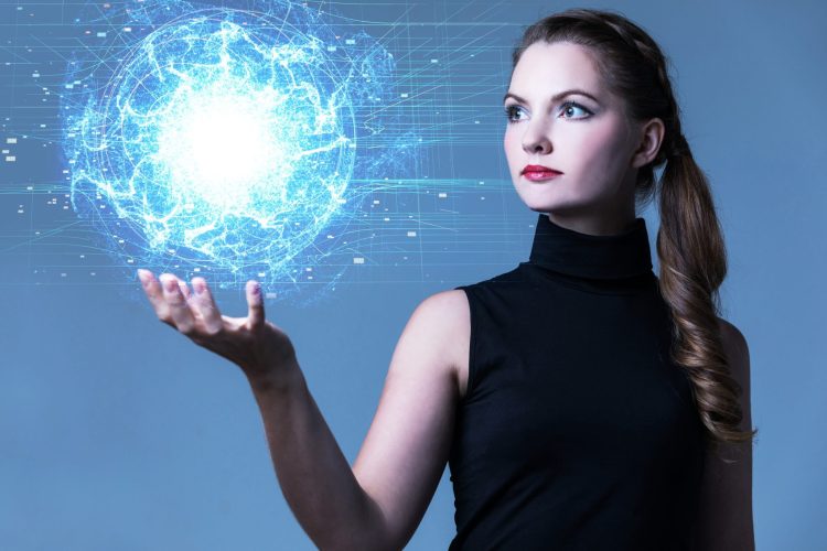 young woman holding a ball of blue energy