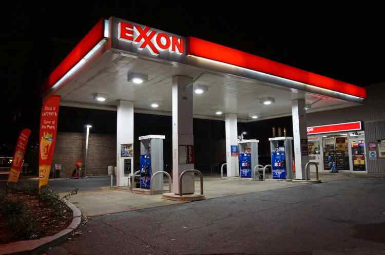 Empty Exxon gas station at night