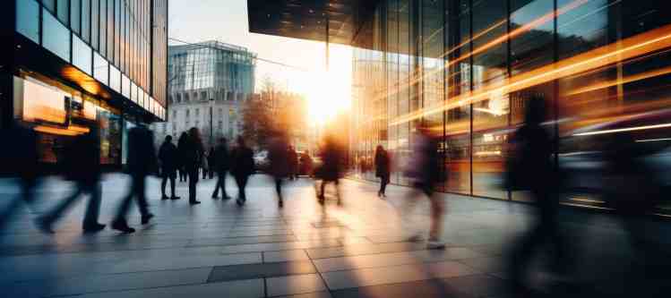 street scene, people walking on the street of a modern city with modern building, pedestrian movement speed effect